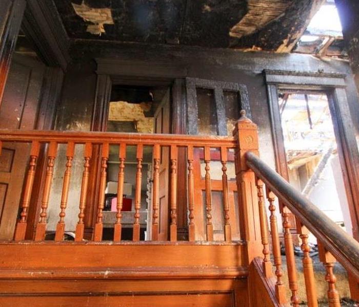 a picture of a room with fire damage