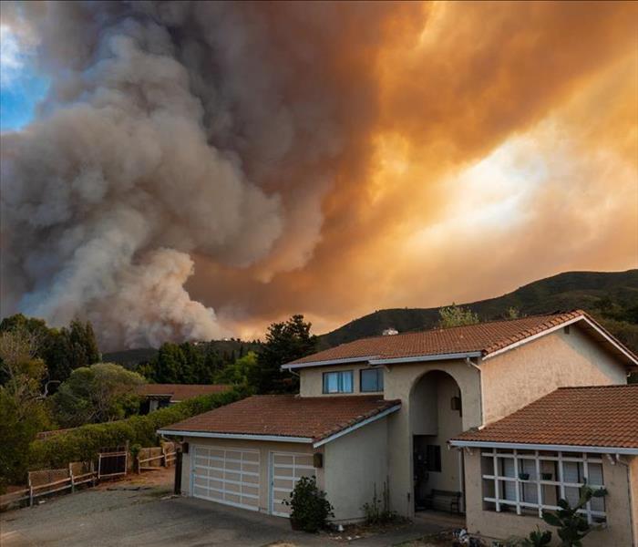 The California "River Fire" fills the sky with dark smoke and flames